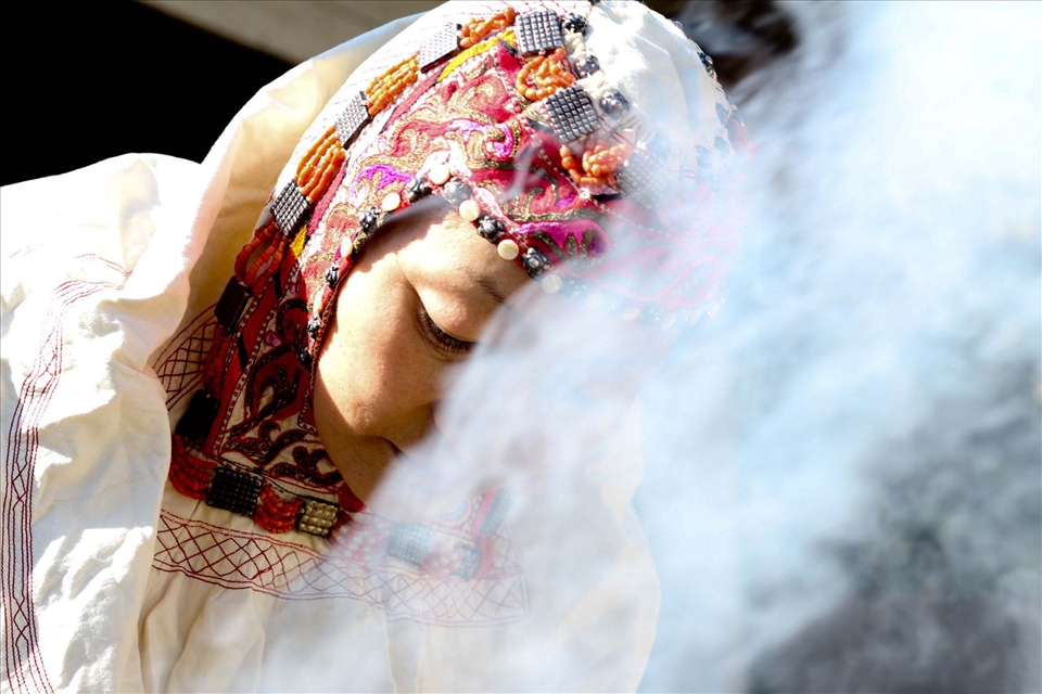 Woman making bread, near Almaty, Kazakhstan