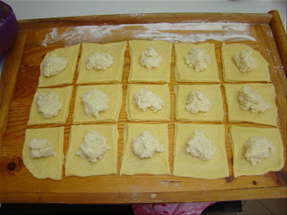 placing the filling on the dough squares