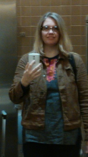 Bright-eyed in my traveling clothes.