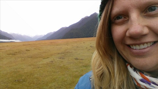Me in the valley. Mountains in the distance.