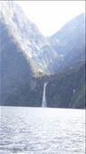 Waterfall on the opposite side of the fjord. On the way back we went right up to it. You can see where the glacier carved a previous valley that used to be the floor of the fjord at one time. : by cfitchey, Views[285]