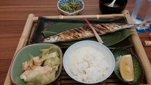 Fancy Japanese lunch with whole grilled fish.