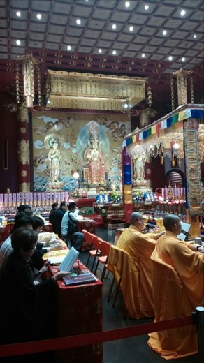 Monks chanting the Sutra in the temple