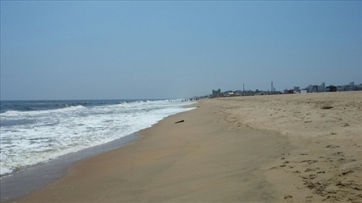 The beach at Chennai. Long and beautiful. A lot of sand in the water this day. And a lot of cute little sand colored scorpions digging holes in the sand. Seriously!