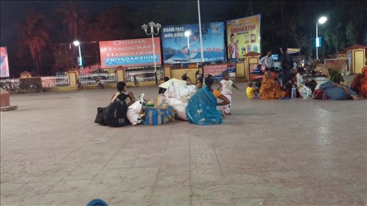 Family waiting at the train station.