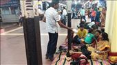 Another family waiting at the train station. They come prepared, with blankets and food. This is very commonplace.: by cfitchey, Views[579]