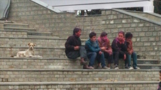 Some kids still in their Holi colors at the chowrasta