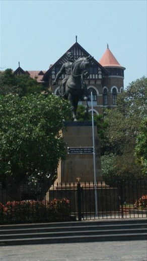 Statue behind gates of India