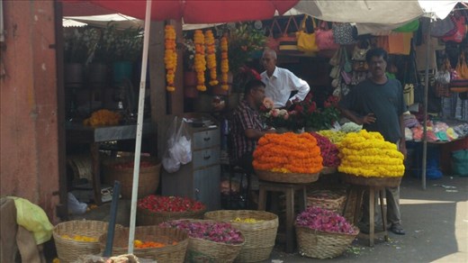 Flowers for sale at the local market. They buy these for offerings at the temple.
