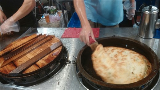 Pancake being fried up