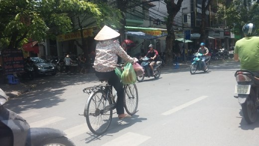 Women cyclists cover up