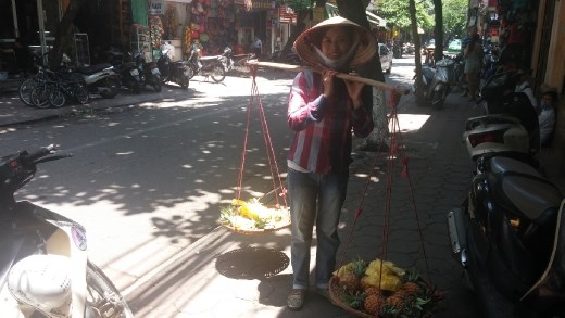 Woman selling fruit in the street