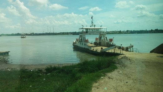 The ferry that will take the bus across the river into Cambodia