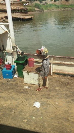 Women selling coffee on the ferry