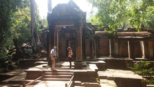 Dad with our guide at the entrance to the Temple of Overgrown Trees