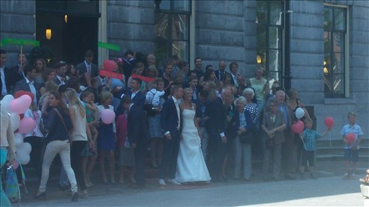 Guests crowd onto the church steps to get into initial photos