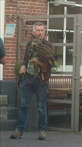 Man and his bird in market square: by cfitchey, Views[298]