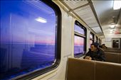 On a Trans-Siberian commuter train, a man admires the morning light on Baikal.: by cgat, Views[476]