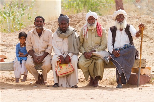 I would like to call this picture ' Generations' & the little girl on the left makes the picture for me. Her playful smile and shy expression against the wise and worldly expression of the men is a wonderful contrast.

Issues around the girl child in India are serious and need a lot of attention - I hope the country realises very soon how precious their daughters are.