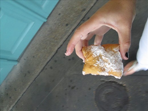 Eating the Yummy Famous Beignets from thee famous Cafe Du Monde