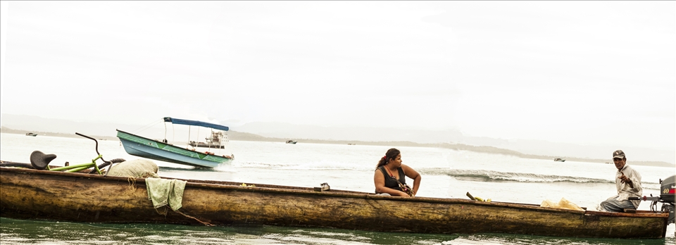 In the Mouth of the Bull, many indigenous families travel in dugout canoes.