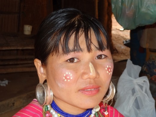 Palong woman with big earrings.