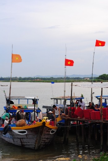 Fishermen unloading catch
