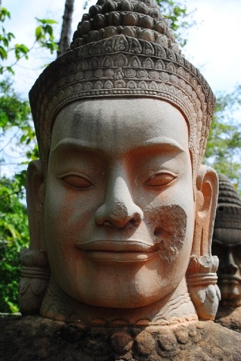 Chandanayika, the god of evil taxi drivers.  As you can tell from the smile on his face, he has LOTS of followers