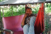 Hung, my private tuk tuk driver all day.  Taking a nap in his hammock waiting for me to finish.: by chicagoguy, Views[412]