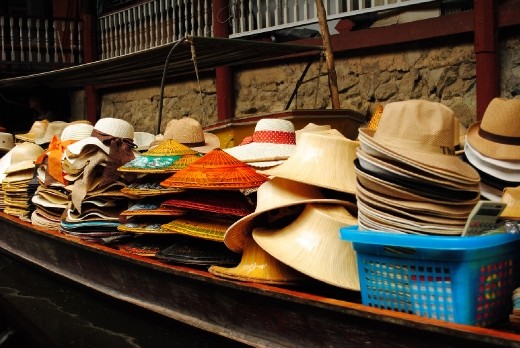 Floating market..hats of all sizes
