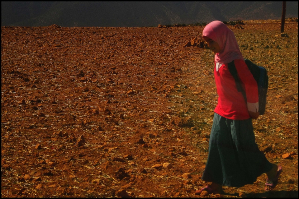 Berberian girl going to school, many kilometres far from her home