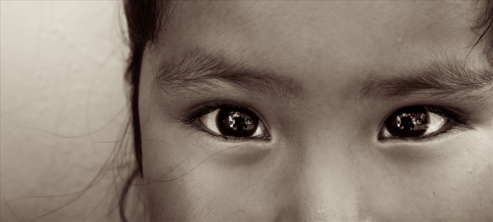 In a peruvian orphanage, a young girl grabs my camera and takes a self-portrait
