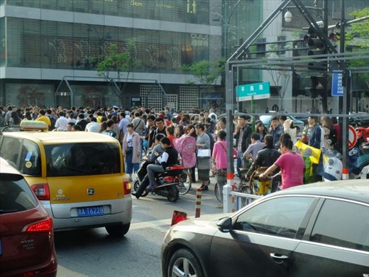 crowds crossing the street