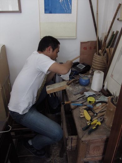 brush shop son makes fan 