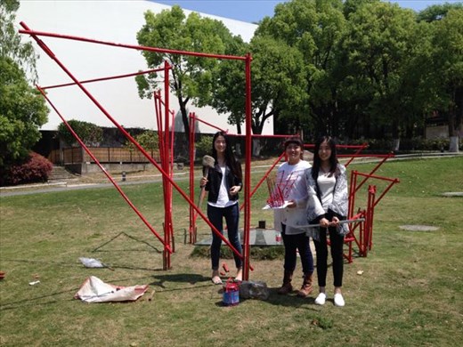 three girls and their artwork
