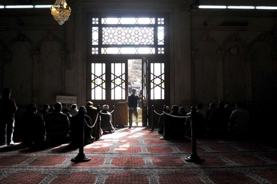 A man enters the Prayer Hall not long after the Muezzin call. Umayyad Mosque, Damascus, Syria.