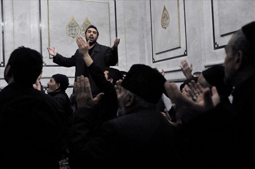 Shiite pilgrims mourning for Imam Hussein. Shrine of Hussein, Umayyad Mosque, Damascus, Syria.