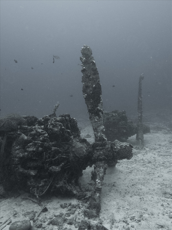 Royal Australian Air Force PBY Catalina A24-11 lies wrecked in 20 meters of water near the entrance of Kavieng's harbor. After refueling one of the bombs on board exploded when the Catalina accidentally hit  a swell during take off. The entire crew was killed.