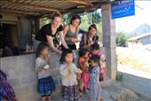 Giving children our leftover bread.  They are well fed but mainly eat rice, bread is a treat for them.: by chris_and_dusk, Views[227]