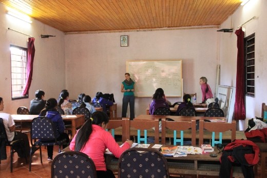 Marie teaching the kids at Sapa O'chau