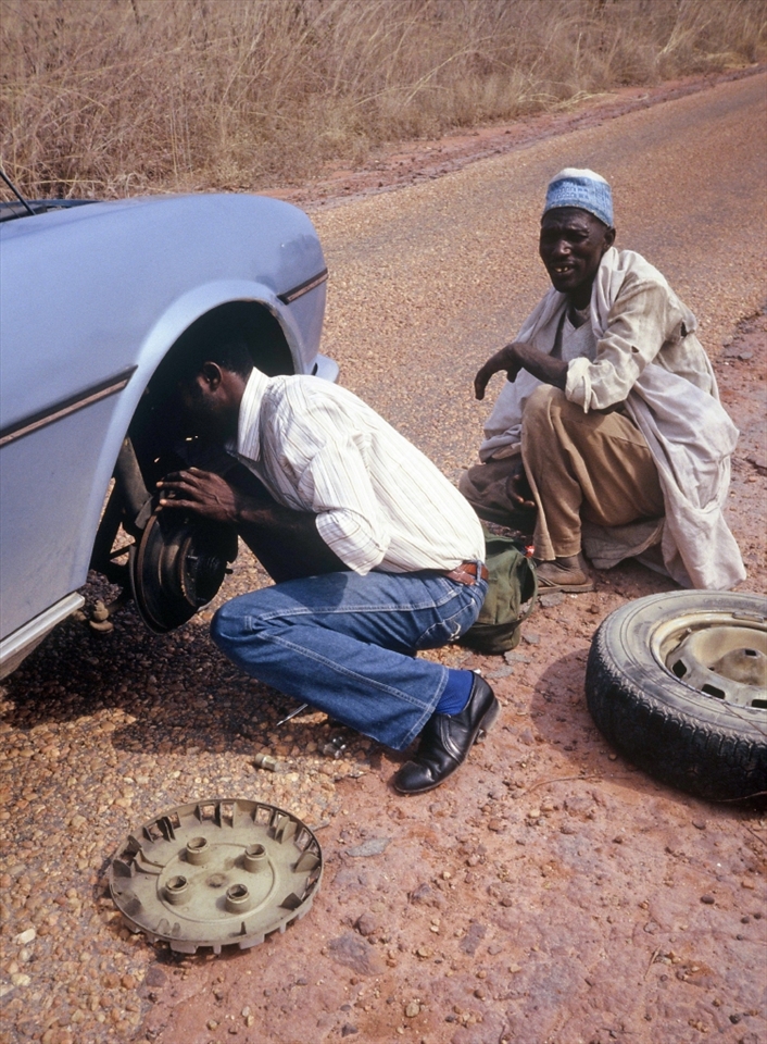 Sometimes strangers that you have helped, end up helping you! We had given this old man a lift and later had a problem with our car. 
Near Abuja. Nigeria. 
