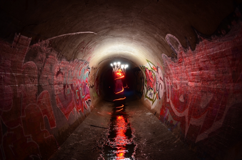 In a burst of light, a secret world erupts around you. An art scene only open to those who would care to explore.