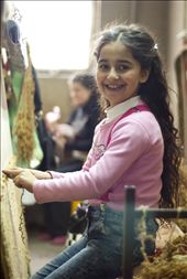 The little girl helps her grandmother to make a carpet.: by chrisnova, Views[253]