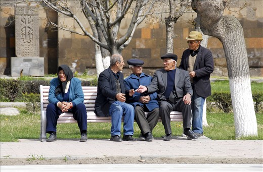 The yard of spiritual centre of the Armenians - Echmiadzin. This woman is the opposite picture of the armenian woman who still in this age are used to wear skirt.