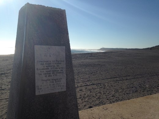 This is a memorial to a shipwreck that occurred in the 1800's, for which the lighthouse in the distance was built. About 45 minutes south of Constitucion.