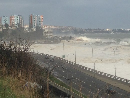 Waves crashing against the coastline Saturday morning. Valparaiso in the distance.