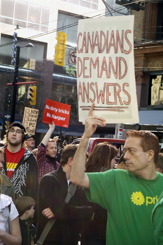 Protesters walking down Young Street in Toronto.