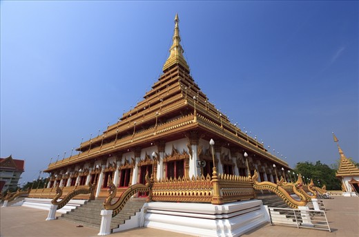 1) The ornate Buddhist pagoda of Phra Maha That Kaen Nakhon, rises majestically 80 meters above Khon Kaen, Thailand. Although apparently deserted, this morning’s air is filled with the chanting that foretells of the millenniums old ceremony held within.