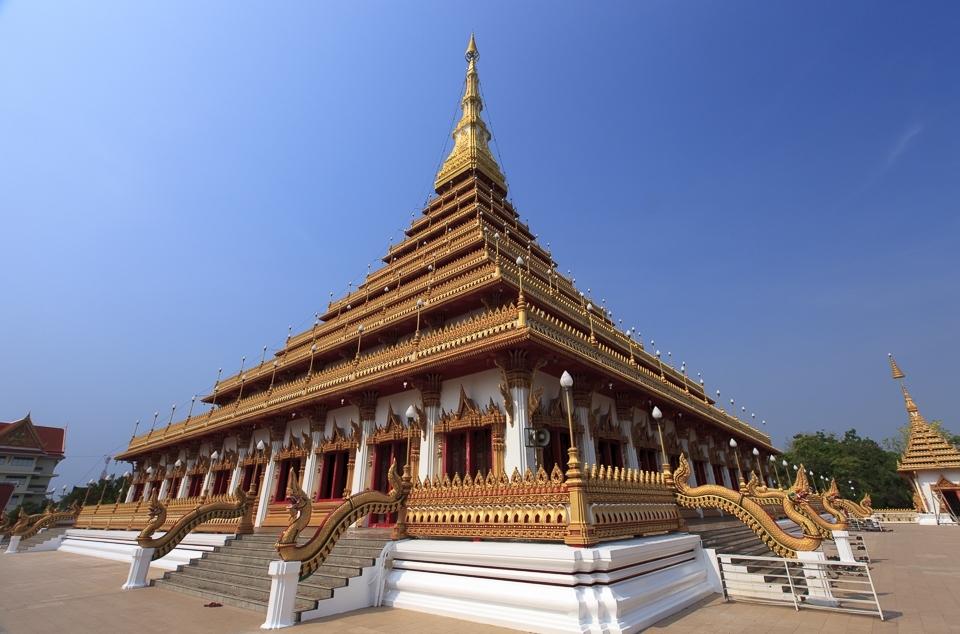 1) The ornate Buddhist pagoda of Phra Maha That Kaen Nakhon, rises majestically 80 meters above Khon Kaen, Thailand. Although apparently deserted, this morning’s air is filled with the chanting that foretells of the millenniums old ceremony held within.