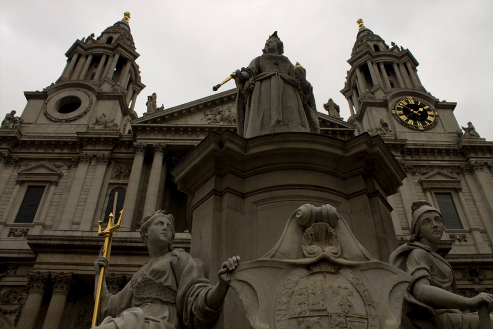 Contrast of the permanent, old and beautiful architecture overshadowing the very temporary nylon city below